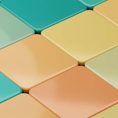 a close up of a multicolored tiled wall